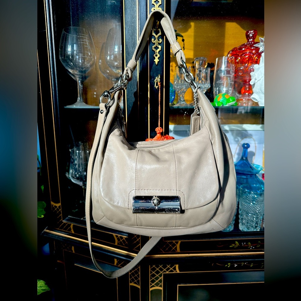 Coach Kristin leather hobo bag in a grayish taupe